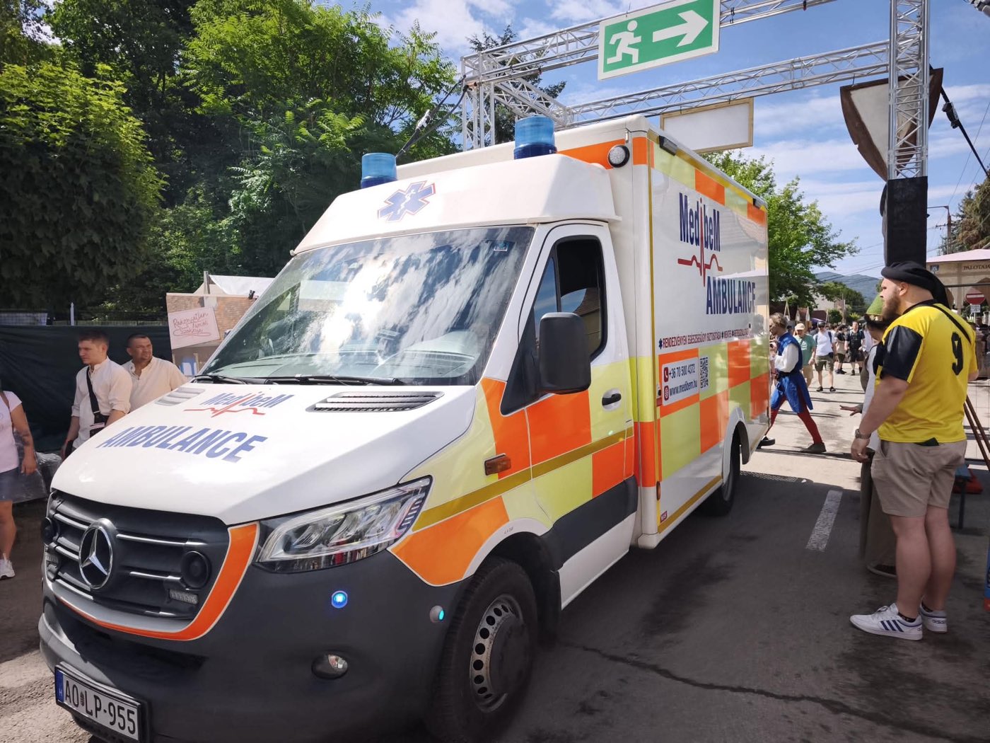 MediBeM ambulance on standby at the entrance of an open-air event